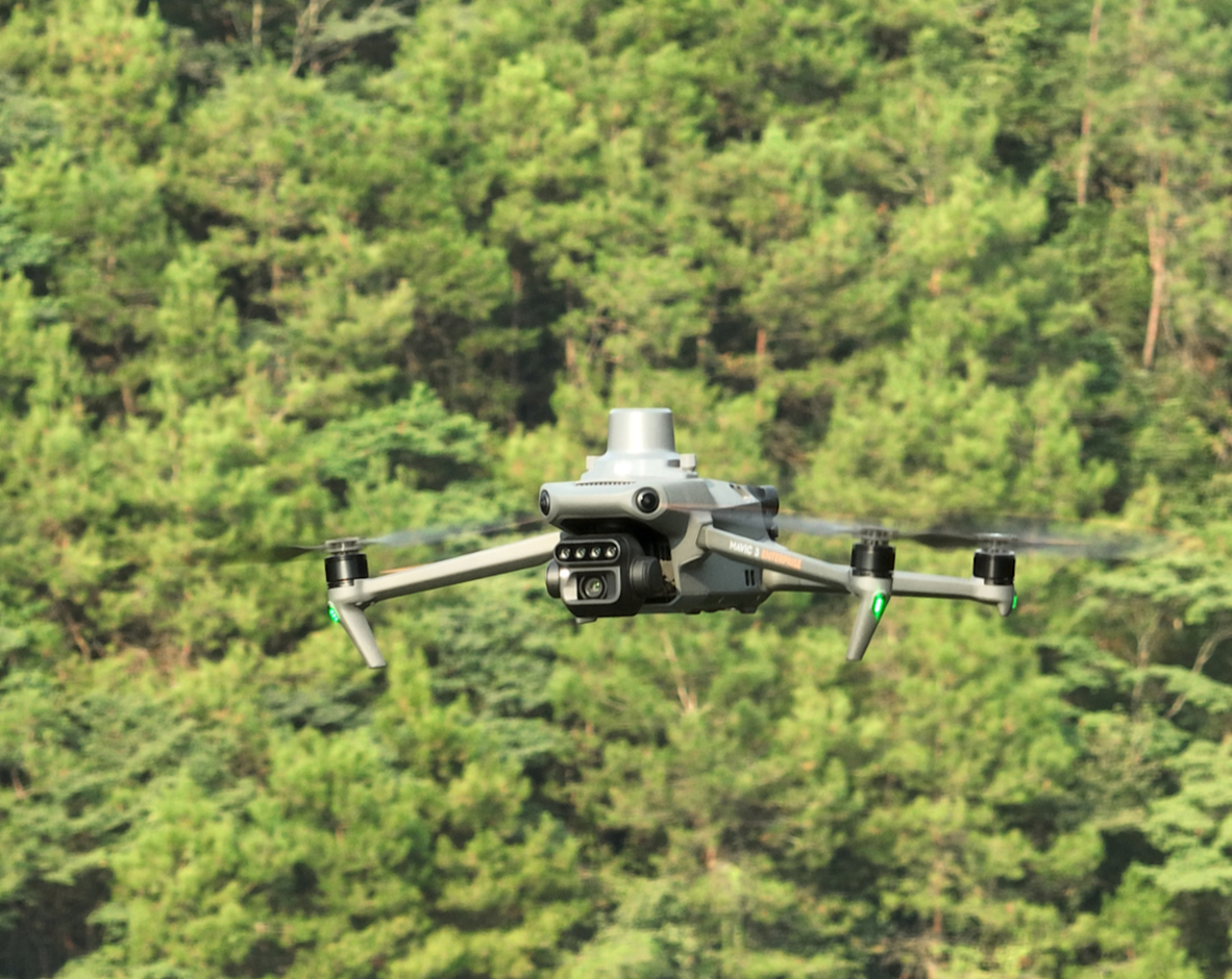 The Mavic 3M doing an Aerial Survey of a forest measuring plant health