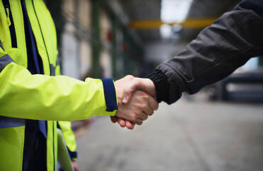 Engineer handshake showing customer first approach